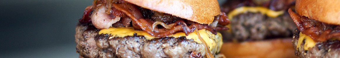 Eating American (Traditional) Burger Vegan at Stack'd Burger Bar restaurant in Milwaukee, WI.